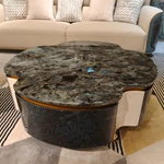 Designer Nesting Coffee Tables with Organic Curves and Layered Silhouettes